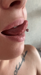 Close-up video captures person with tongue piercing in Vladimir