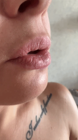 Close-up video captures person with tongue piercing in Vladimir