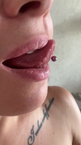 Close-up video captures person with tongue piercing in Vladimir