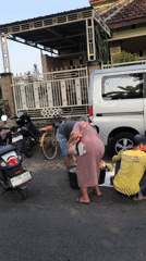 Everyday street life across two Indonesian village neighborhoods