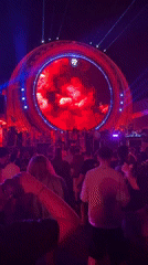 Big circular screen lights up a nighttime event in Costinești