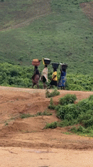 Daily life documented in rural Jawu, Nigeria near rocky landscape