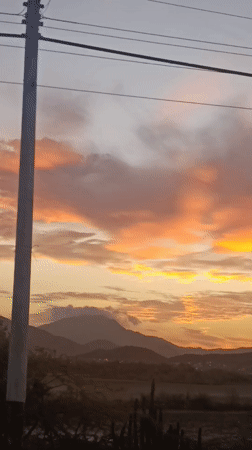 Vibrant sunset captured over mountains in Juan Griego, Venezuela