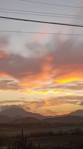 Vibrant sunset captured over mountains in Juan Griego, Venezuela