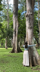 Woman enjoys morning park visit in Kuta Selatan