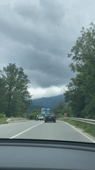 Morning traffic moves through mountainous roads near Kostandovo, Bulgaria