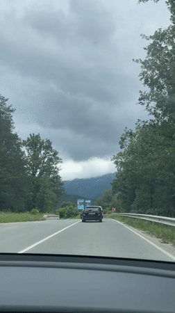 Morning traffic moves through mountainous roads near Kostandovo, Bulgaria