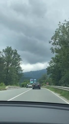 Morning traffic moves through mountainous roads near Kostandovo, Bulgaria