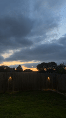Dusk backyard scene captured in Mustang, Oklahoma