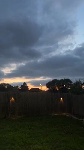 Dusk backyard scene captured in Mustang, Oklahoma