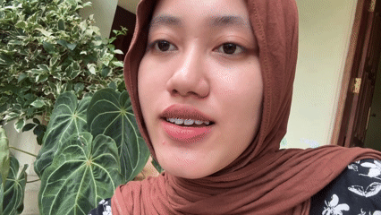 Woman in hijab filmed in Gadingrejo, Indonesia