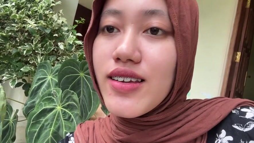 Woman in hijab filmed in Gadingrejo, Indonesia