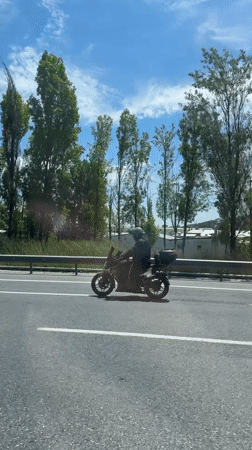 Motorcyclist travels highway in Gaziosmanpaşa, Turkey