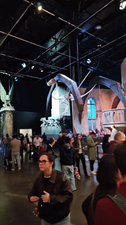 Visitors explore Harry Potter studio tour exhibits in Watford