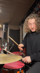 Drummer performs indoor session in Yekaterinburg studio