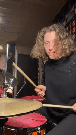Drummer performs indoor session in Yekaterinburg studio