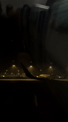 Passenger documents nighttime aircraft operations at Shanghai Pudong Airport