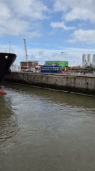 Wind turbine cargo ship OSTRO I transiting Brunsbüttel lock