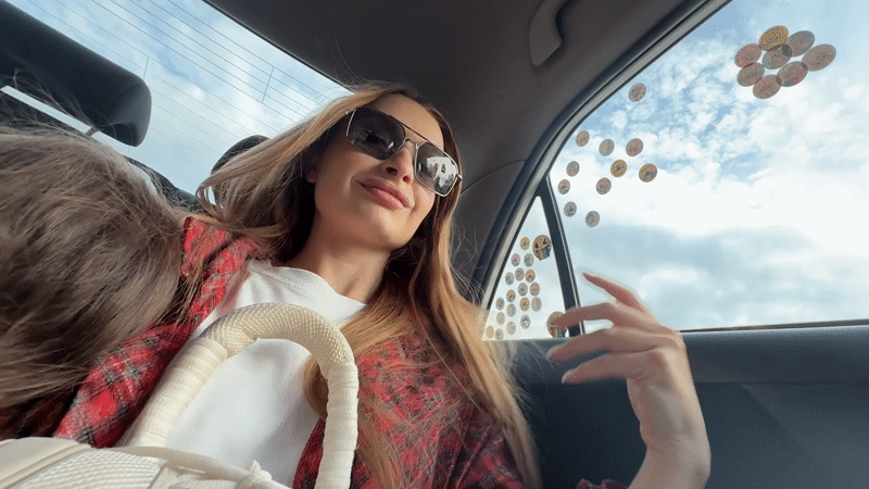 Woman in car and mountain landscape captured in Montenegro