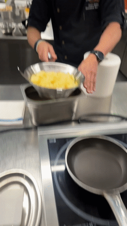 Cooking class documented at Madrid hotel kitchen