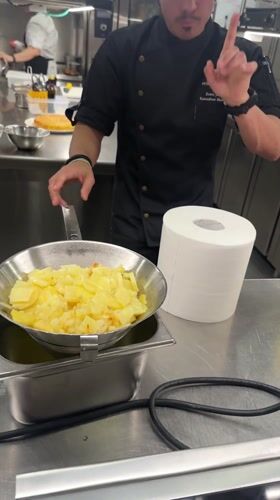 Cooking class documented at Madrid hotel kitchen