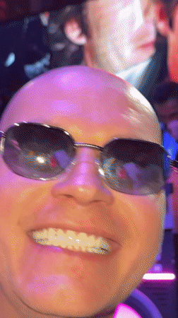 Nightclub patrons film selfies during performance in Druzhba, Russia