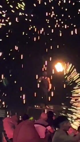 Fire dancer performs with fireworks show in Baan Bo Phut