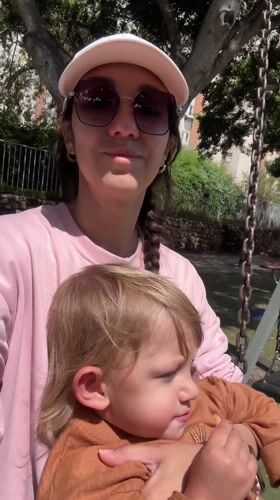 Mother and child enjoy morning playtime at Bat Yam park