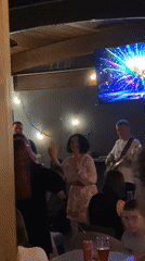 Live band entertains dancing crowd at Bar, Montenegro venue