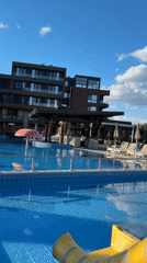 Tourist documents sunny resort stay in Bania, Bulgaria