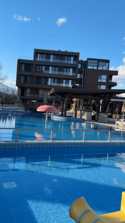 Tourist documents sunny resort stay in Bania, Bulgaria
