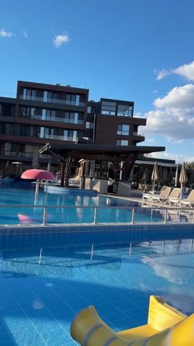 Tourist documents sunny resort stay in Bania, Bulgaria