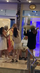 Belly dancers perform for tourists outside Alanya hotel
