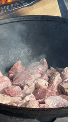 Traditional outdoor cooking scene documented in Valevaya, Russia