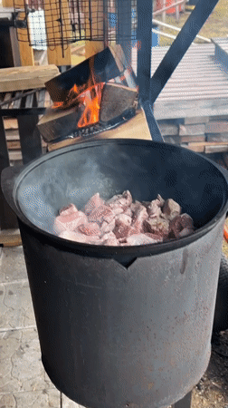 Traditional outdoor cooking scene documented in Valevaya, Russia