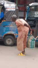 Daily street life documented in Nigerian towns during afternoon