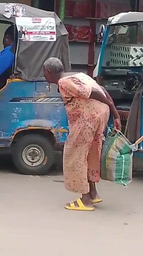 Daily street life documented in Nigerian towns during afternoon