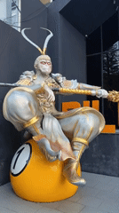 Da Lat street scenes feature Monkey King statue, hotels