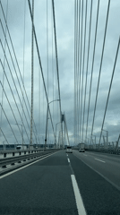 Morning traffic crosses Yavuz Sultan Selim Bridge in overcast conditions