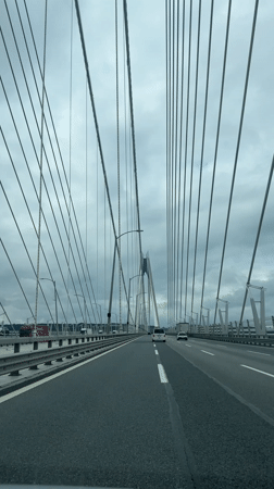 Morning traffic crosses Yavuz Sultan Selim Bridge in overcast conditions