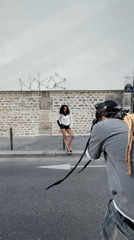 Street photographer conducts casual photo shoot in Paris