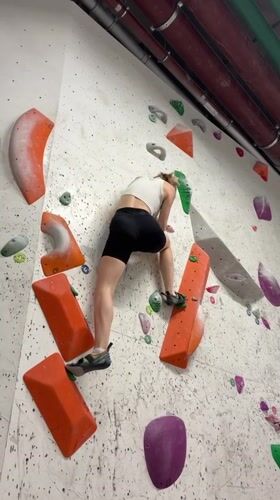Indoor climbing session on a white wall in Khimki