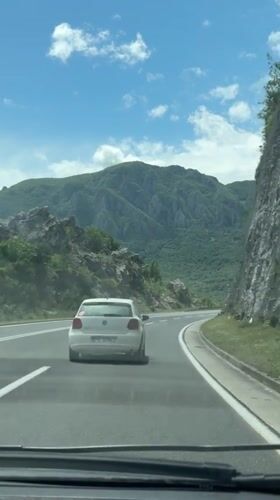 Dashboard camera captures highway drive in Montenegro mountains