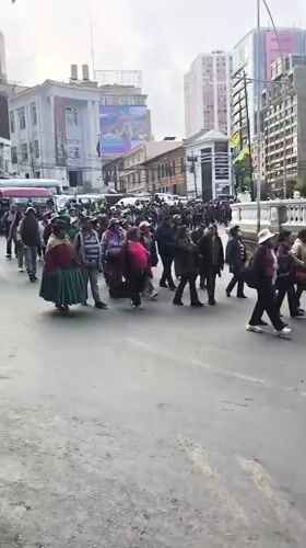 Adults march in demonstration on La Paz street