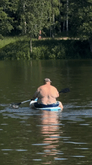 Morning lake recreation captured in Malakhovka, Russia