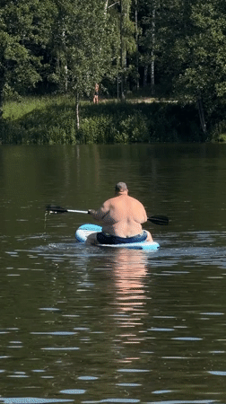 Morning lake recreation captured in Malakhovka, Russia