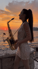 Saxophone performance at sunset on the Adriatic coast