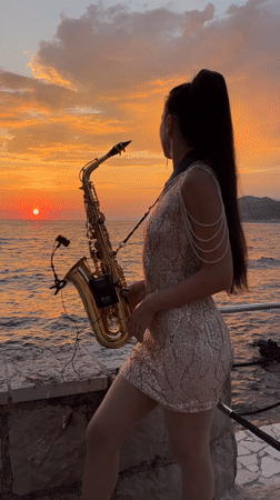 Saxophone performance at sunset on the Adriatic coast