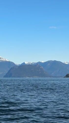 West Vancouver waterfront scene captured showing cliffs, homes, trees