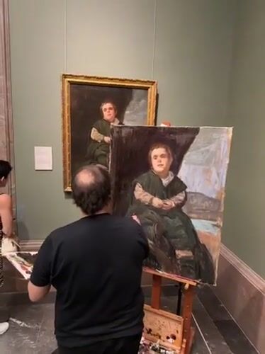 Visitor documents extensive art collection during Prado Museum afternoon tour